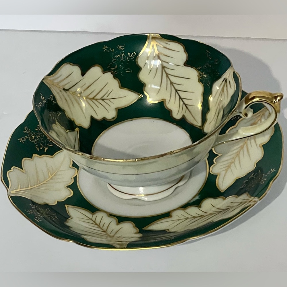 Vintage Ucagco Hand Painted Teacup and Saucer    Green Leaf